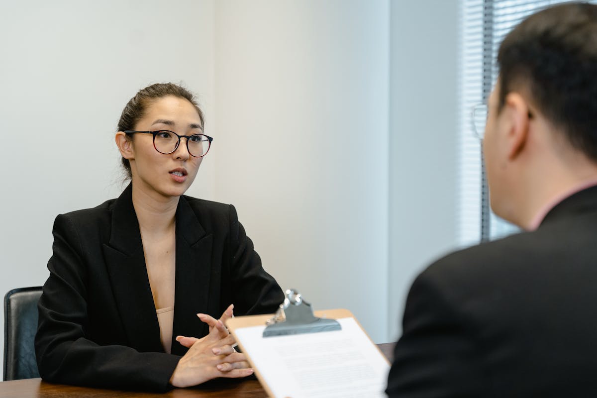 a furniture business owner speaking with a Vietnamese mosaic factory’s representative