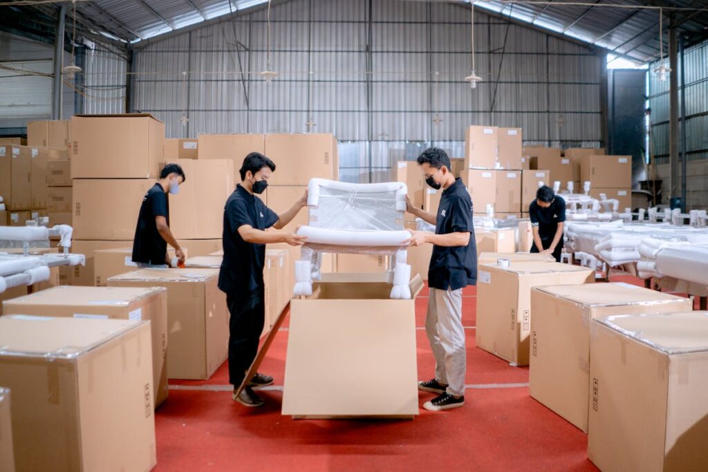 workers at a Vietnam furniture factory preparing products for shipment